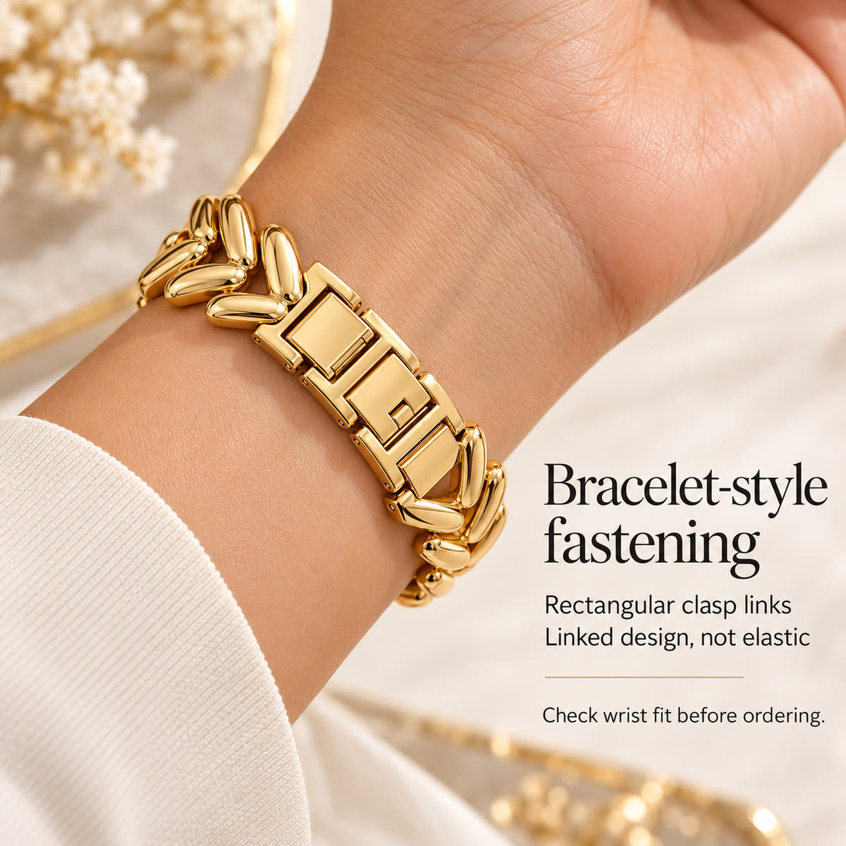 Monelle rectangular bracelet clasp links shown on the underside of a wrist