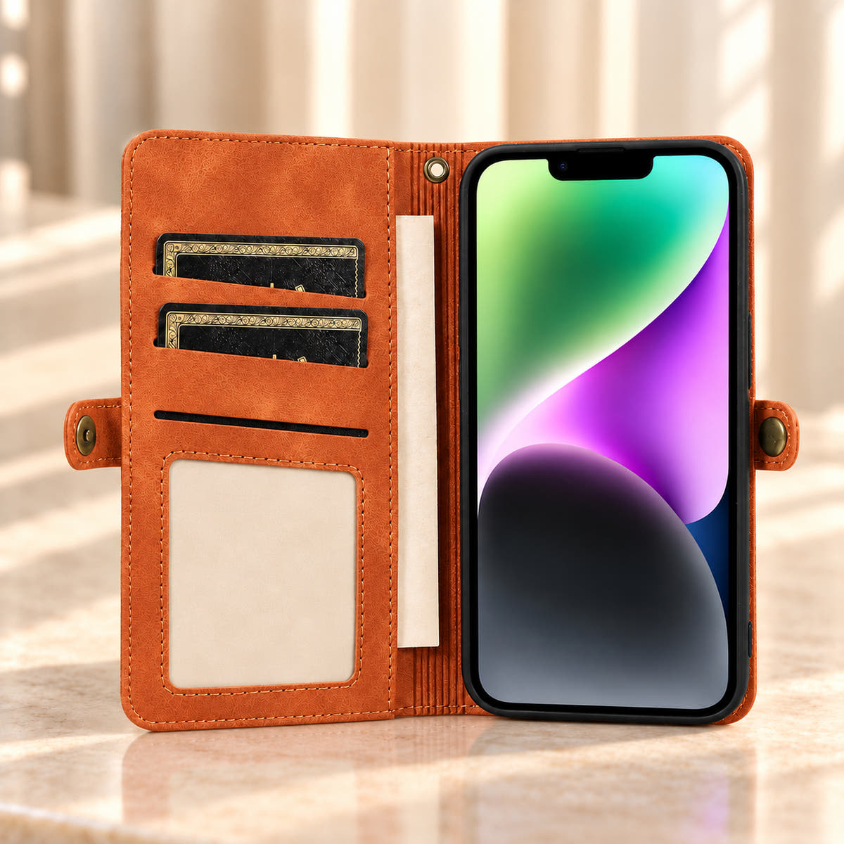 Open Brown BlushCarry wallet phone case showing inner card storage, a rectangular photo window, notes pocket and bronze-tone snap tabs.