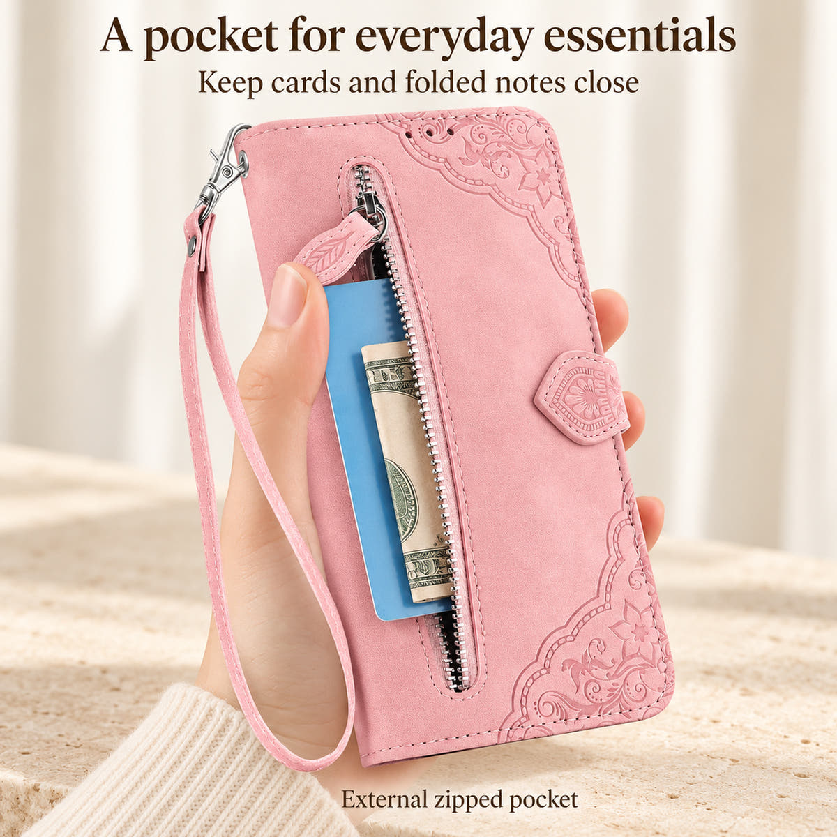 Pink Botanical wallet case with its external zipper pocket open, displaying a card and folded note to show the pocket opening.