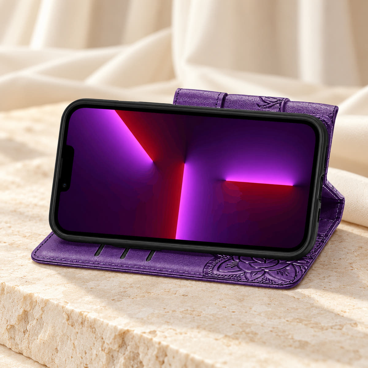 Butterfly iPhone wallet case in Purple folded into its landscape stand, with the original interior card-slot edges visible.
