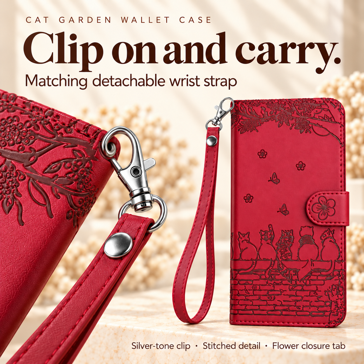 Cat Garden detachable wrist strap guide showing the silver-tone clip, stitched loop and flower closure tab on the Ruby Red case.
