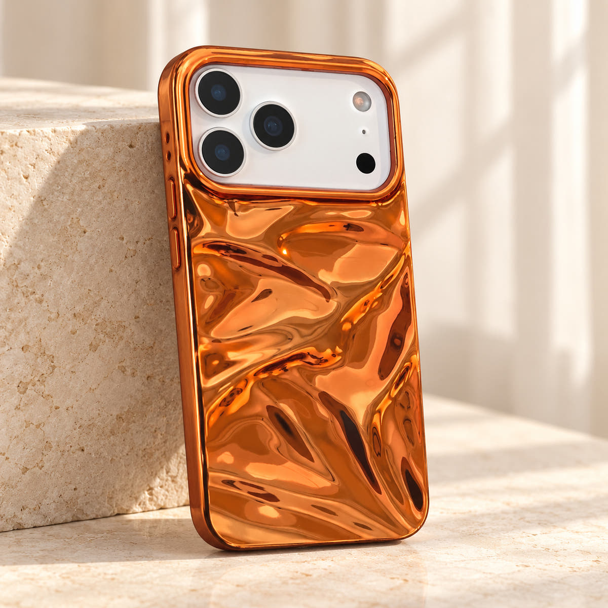 Copper-orange Chrome Wave iPhone case — angled close view