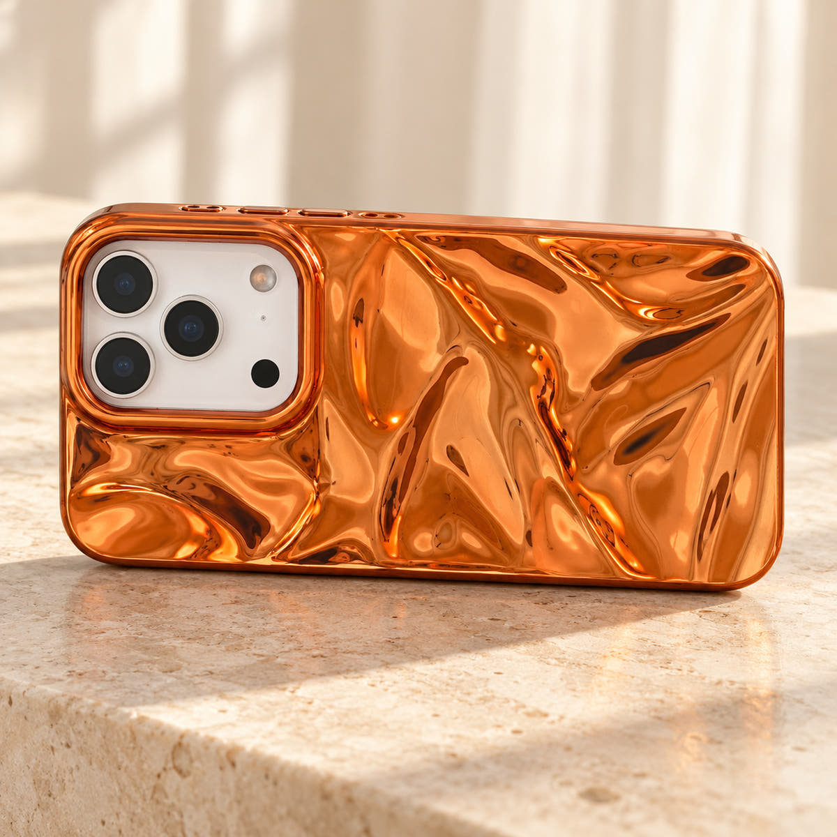 Copper-orange Chrome Wave iPhone case — landscape tabletop view