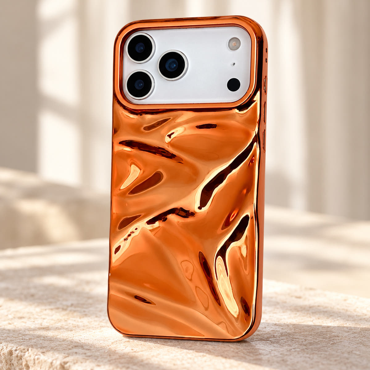 Copper-orange Chrome Wave iPhone case — upper detail view