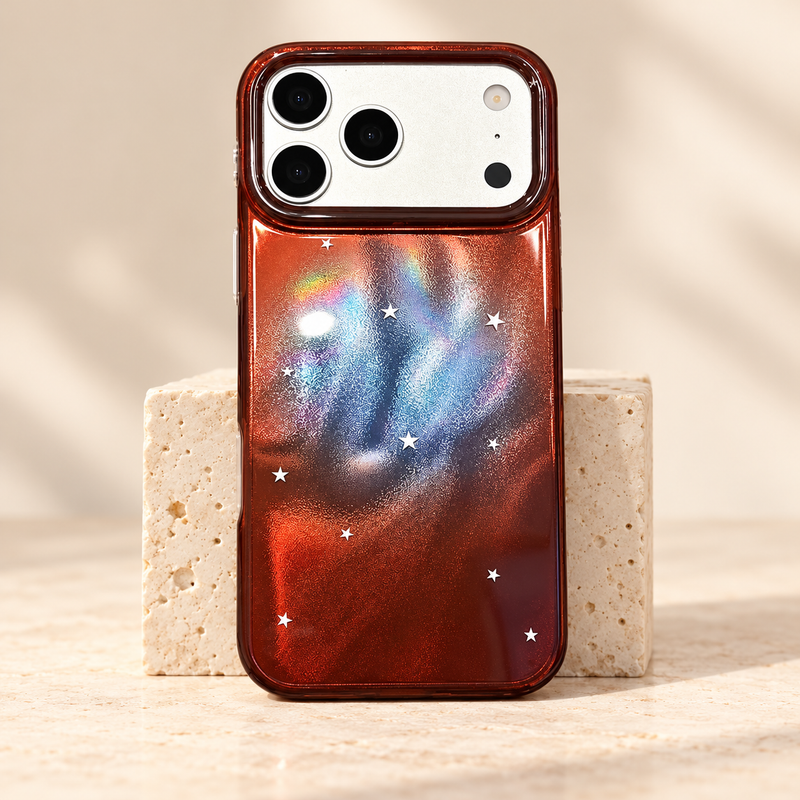 Copper Nebula Star iPhone Case with a copper-brown border and blue-silver starry back.