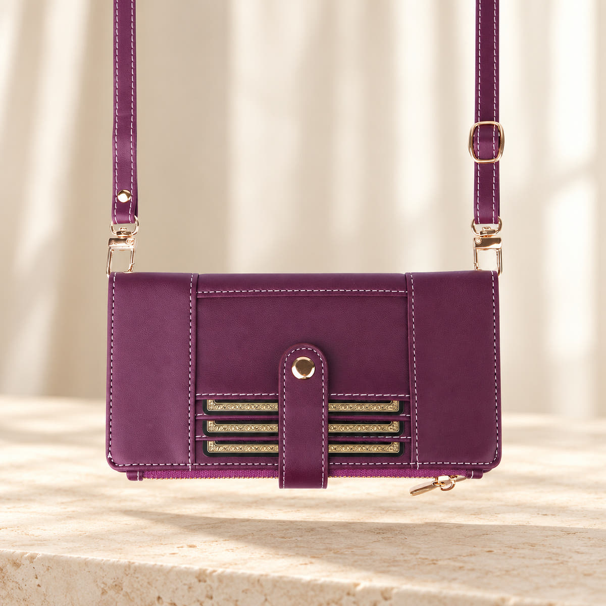 Elaris Crossbody iPhone wallet case in Purple, landscape view with adjustable crossbody strap.