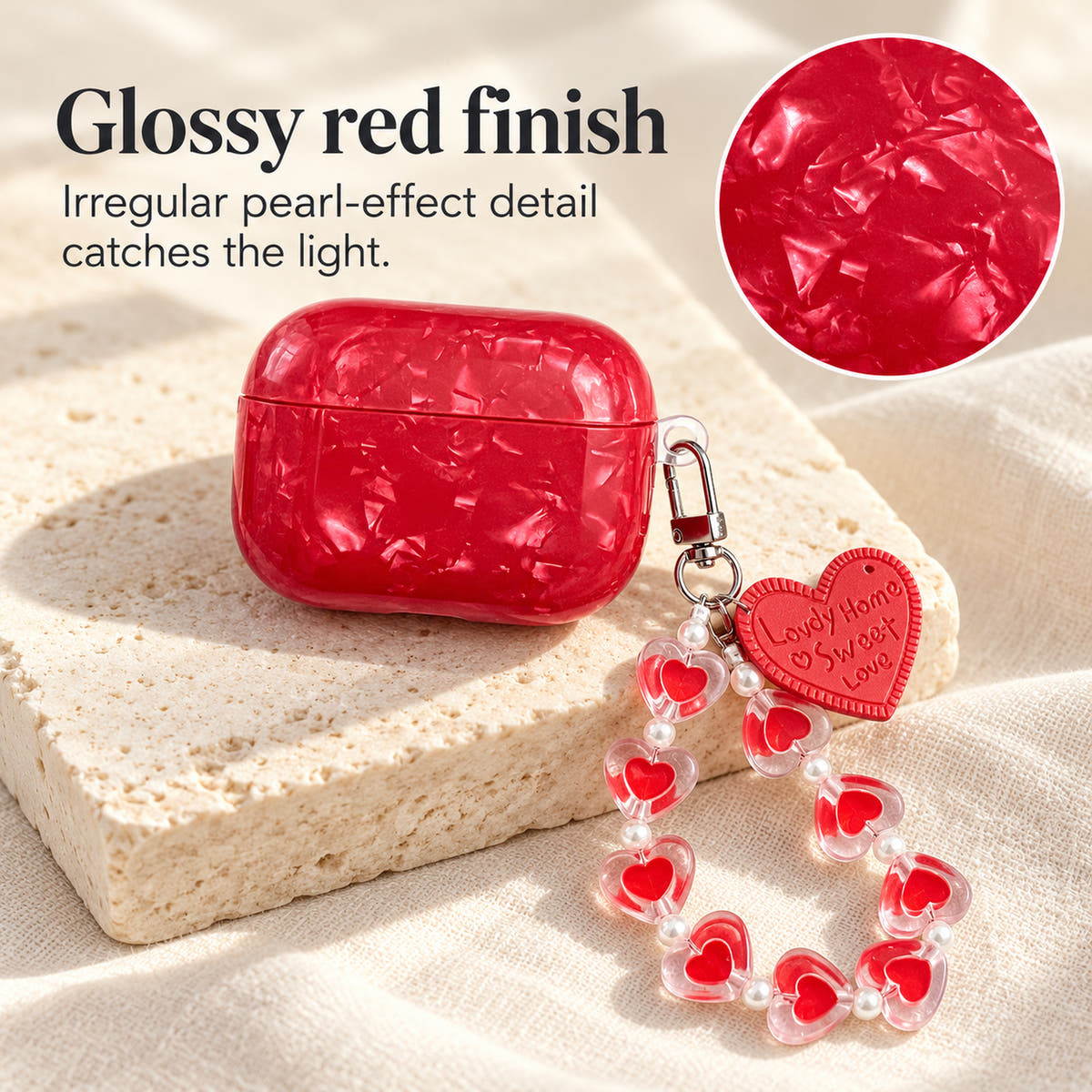 Garnet Marble AirPods case — glossy finish with glossy red finish and heart-bead charm strap