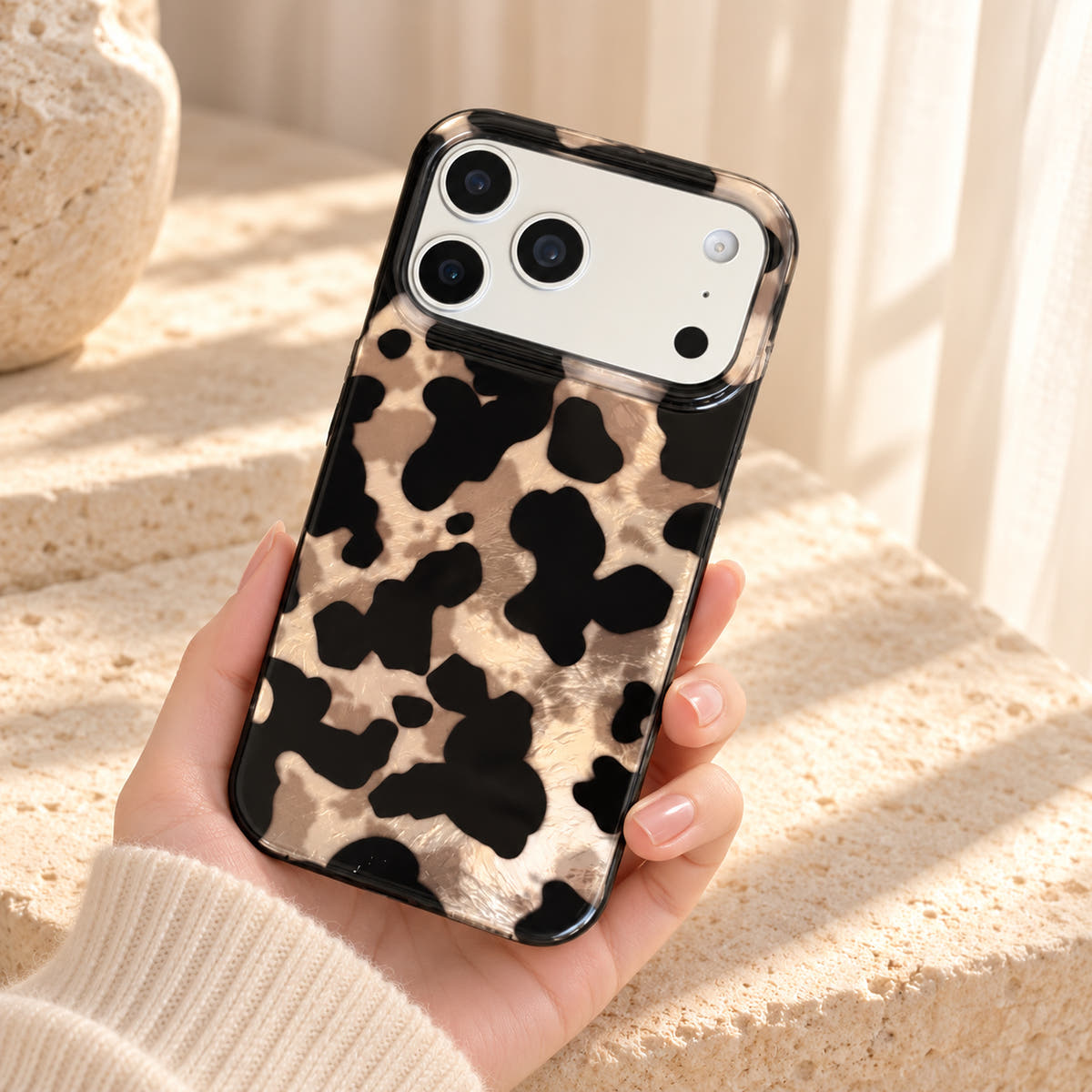 Glam Kitty case without kitty held at a gentle angle, showing the patterned rear and original edge profile.