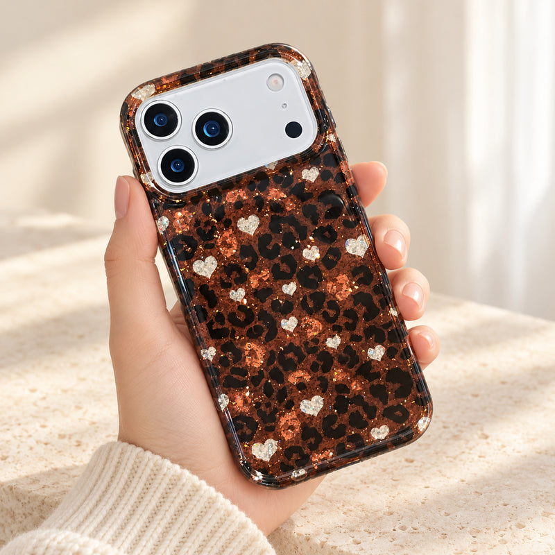 Glitter Leopard Heart iPhone case held upright showing its full back design