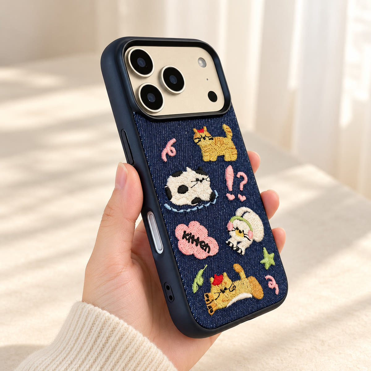 Kawaii Cat Embroidered Denim iPhone case — handheld scale view