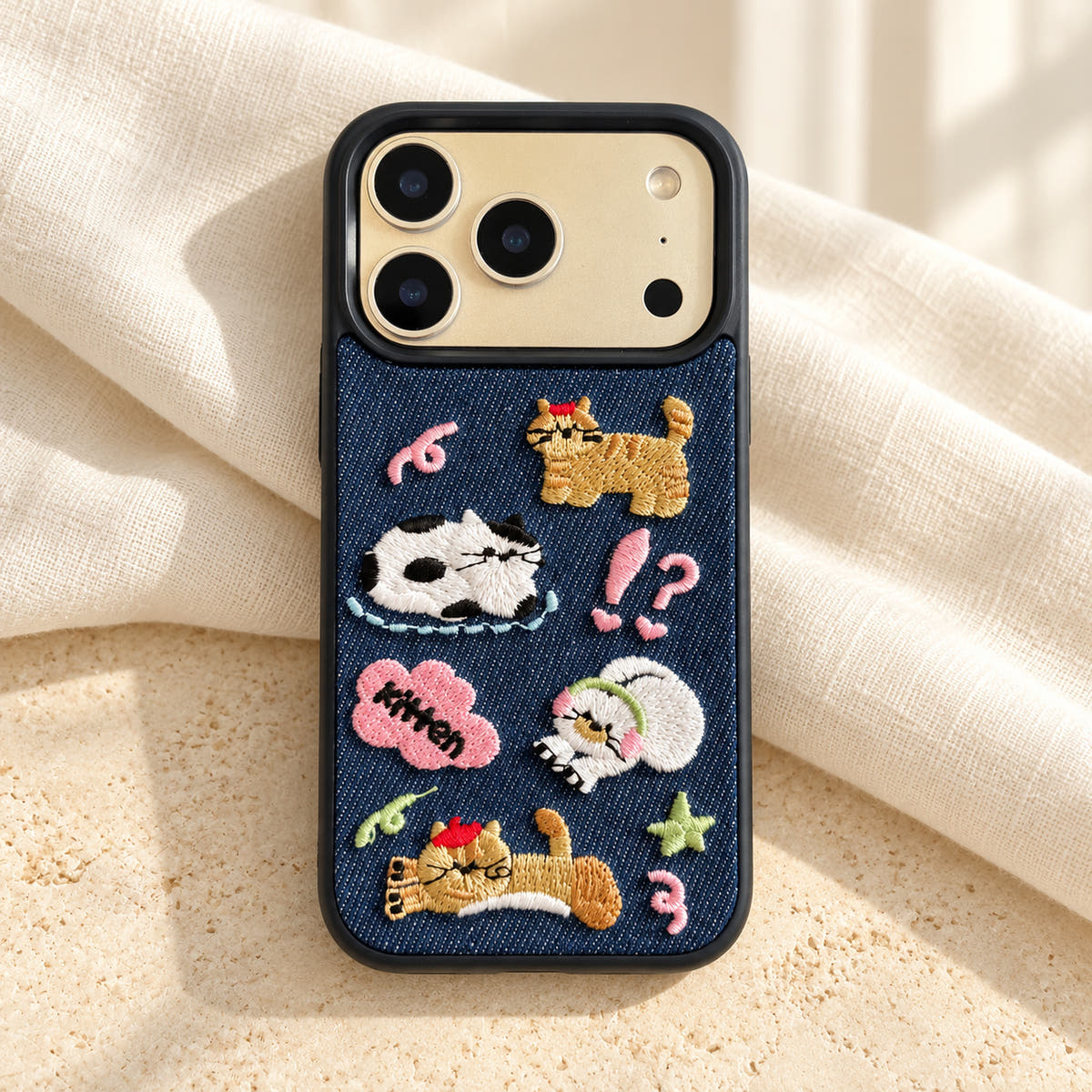 Kawaii Cat Embroidered Denim iPhone case — linen flatlay view