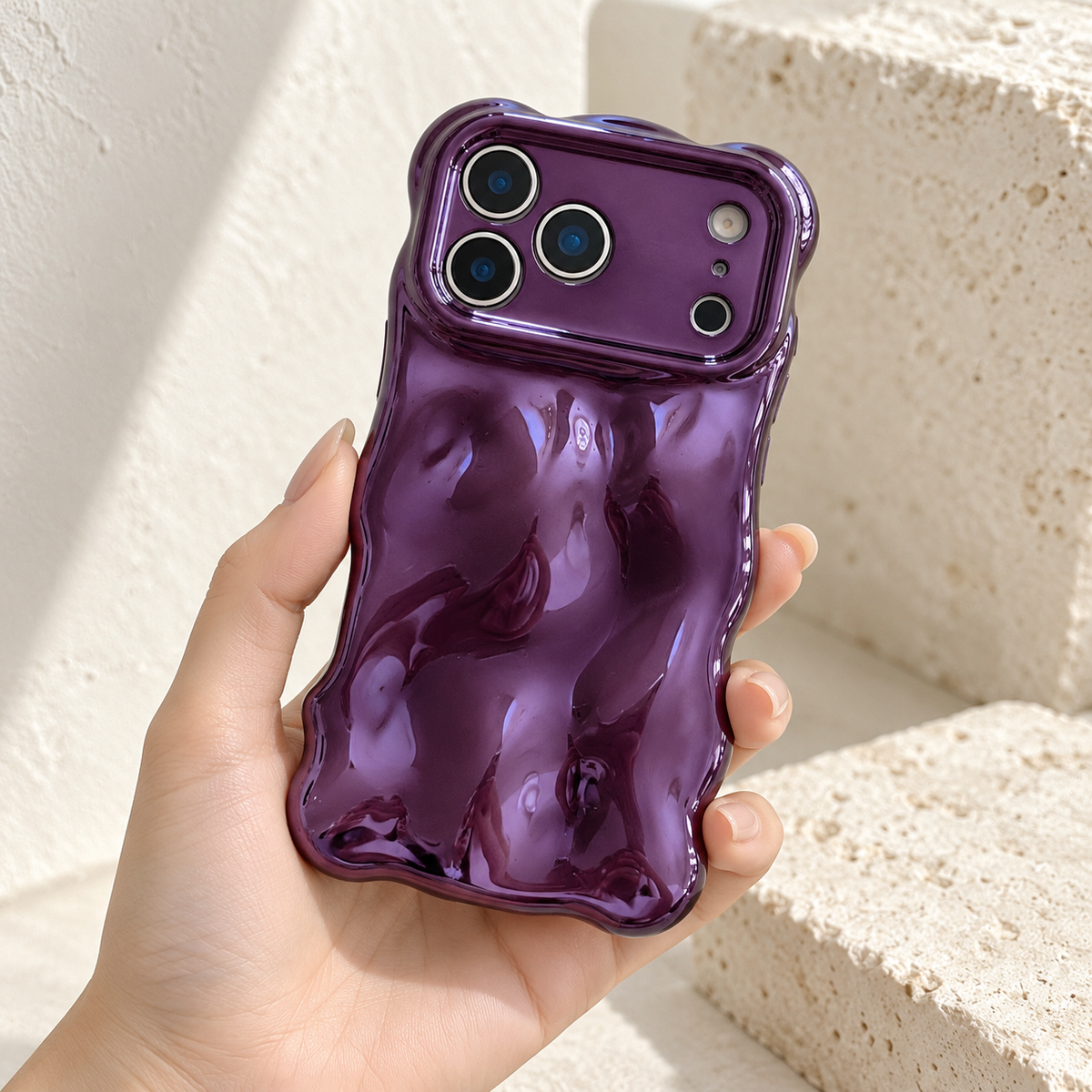 Liquid Chrome Wave iPhone case in Purple shown in a natural lifestyle view.