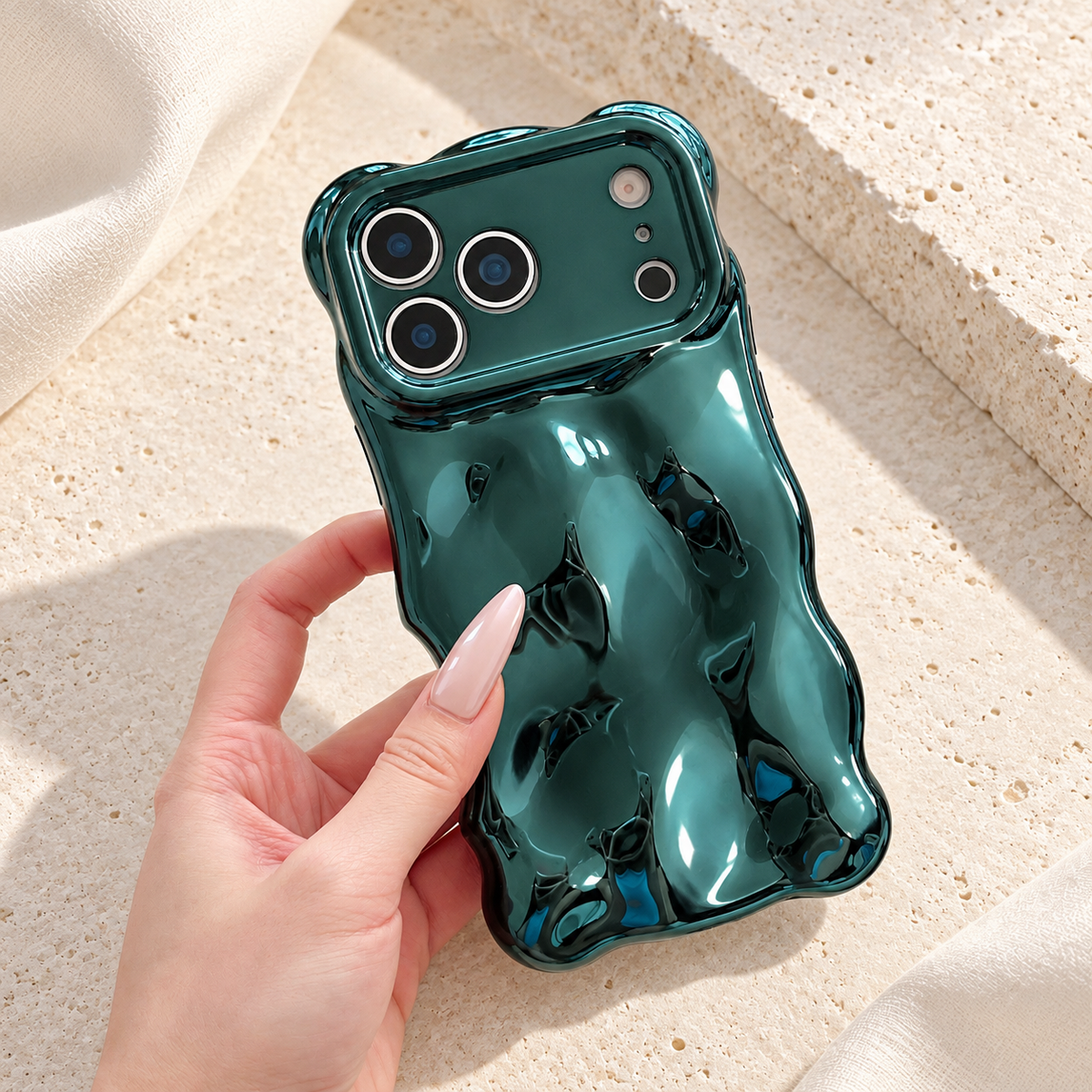 Liquid Chrome Wave iPhone case in Teal shown in a natural lifestyle view.