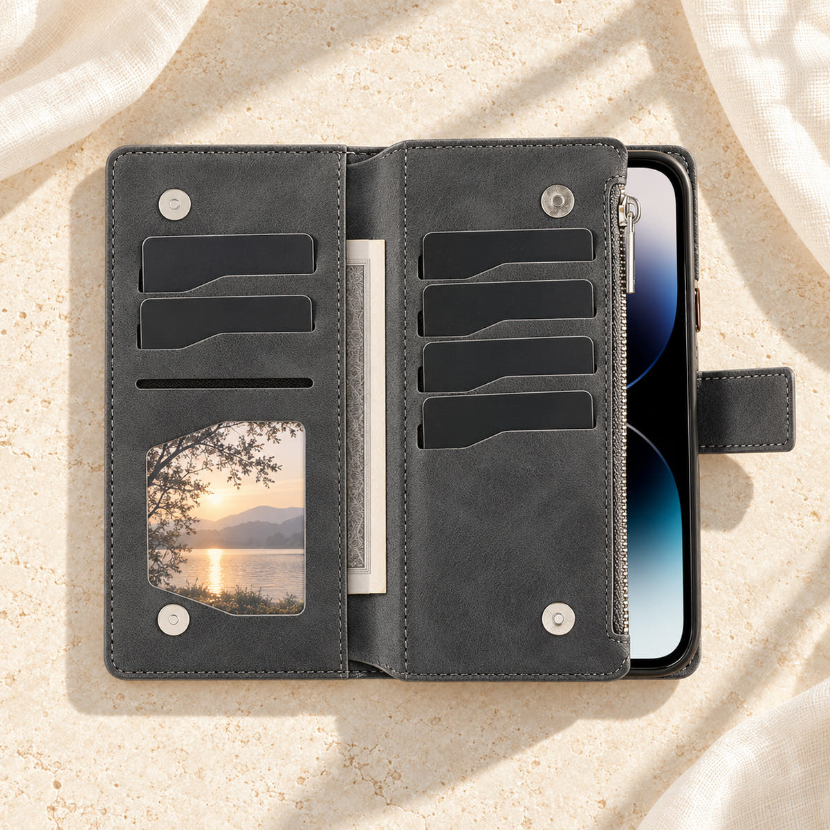 Lotus Mandala iPhone wallet case in Black showing the foldout card panels, photo window and notes sleeve