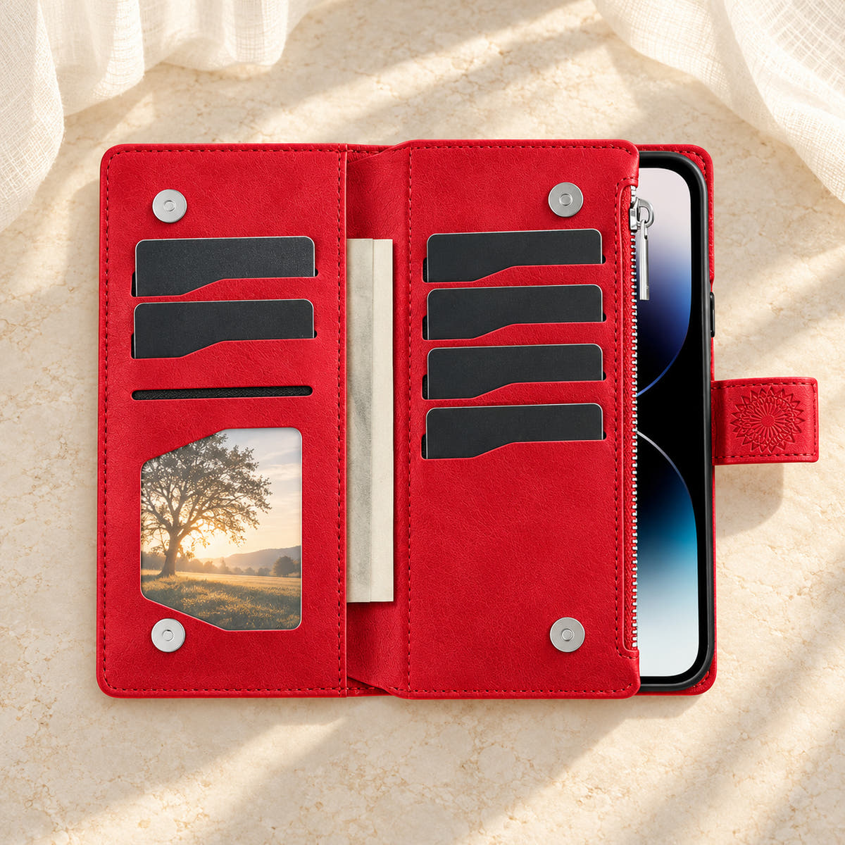 Lotus Mandala iPhone wallet case in Red showing the foldout card panels, photo window and notes sleeve