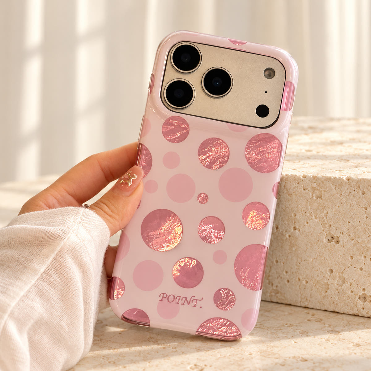Metallic Dots & Stars iPhone case in Pink — studio view