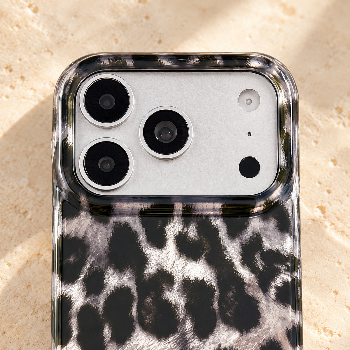 Wide camera opening and clear upper edge of the black and silver case.