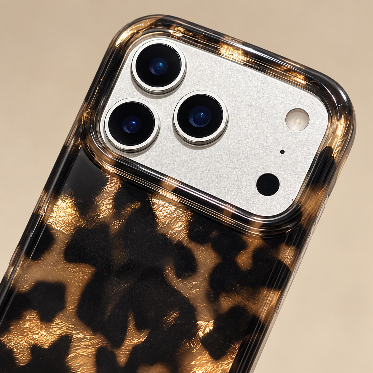 Dark Tortoiseshell iPhone case with black and warm brown mottled pattern — upper camera surround close-up.