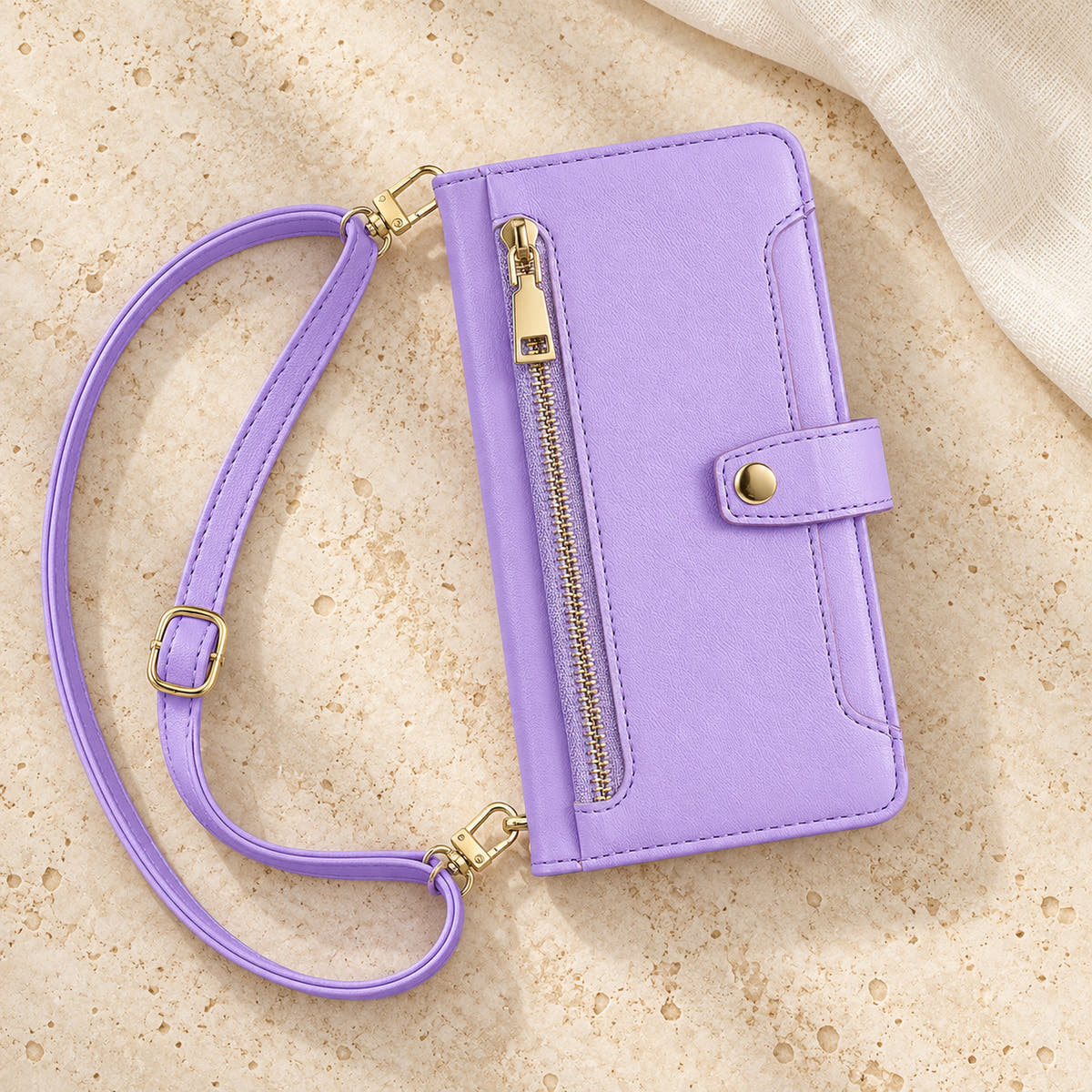 Minimal crossbody iPhone wallet case in Lavender — overhead front view with matching adjustable shoulder strap
