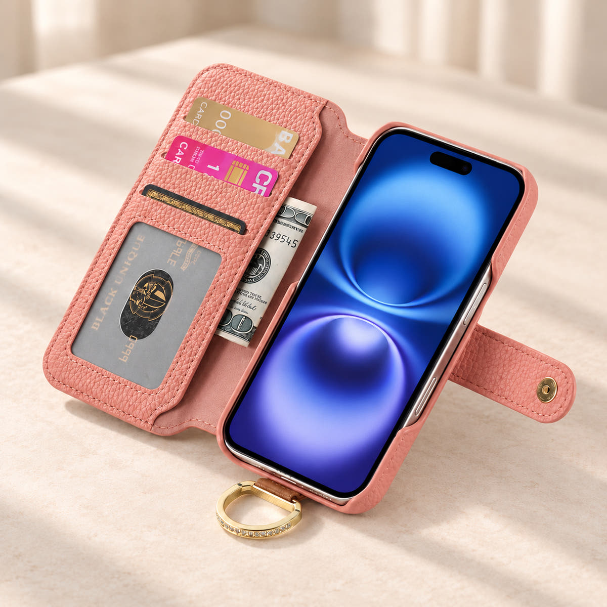 Pink iPhone wallet case opened to show three card slots, an ID window, a note pocket and the fitted phone holder