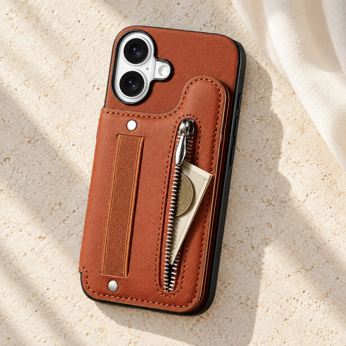 Multi-Pocket iPhone wallet case in Brown on cream limestone with its rear zip pocket open