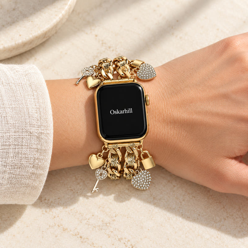 Oskar Hill Amorette Apple Watch charm band — on a feminine wrist with visible charm details