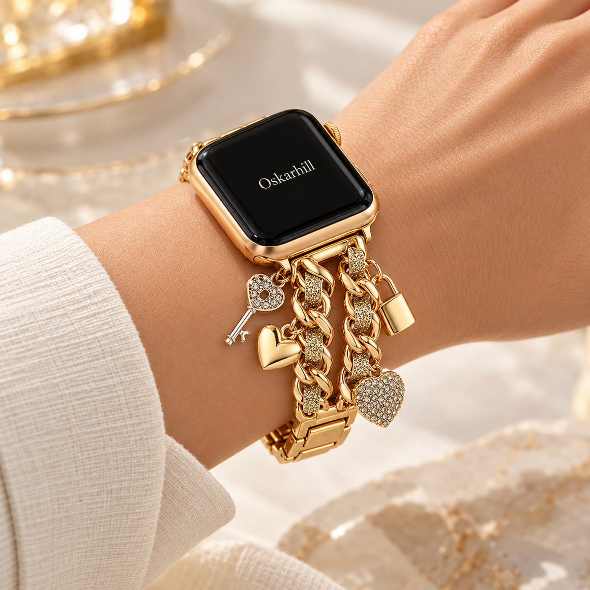 Oskar Hill Amorette Apple Watch charm band — side view showing both chains and dangling charms