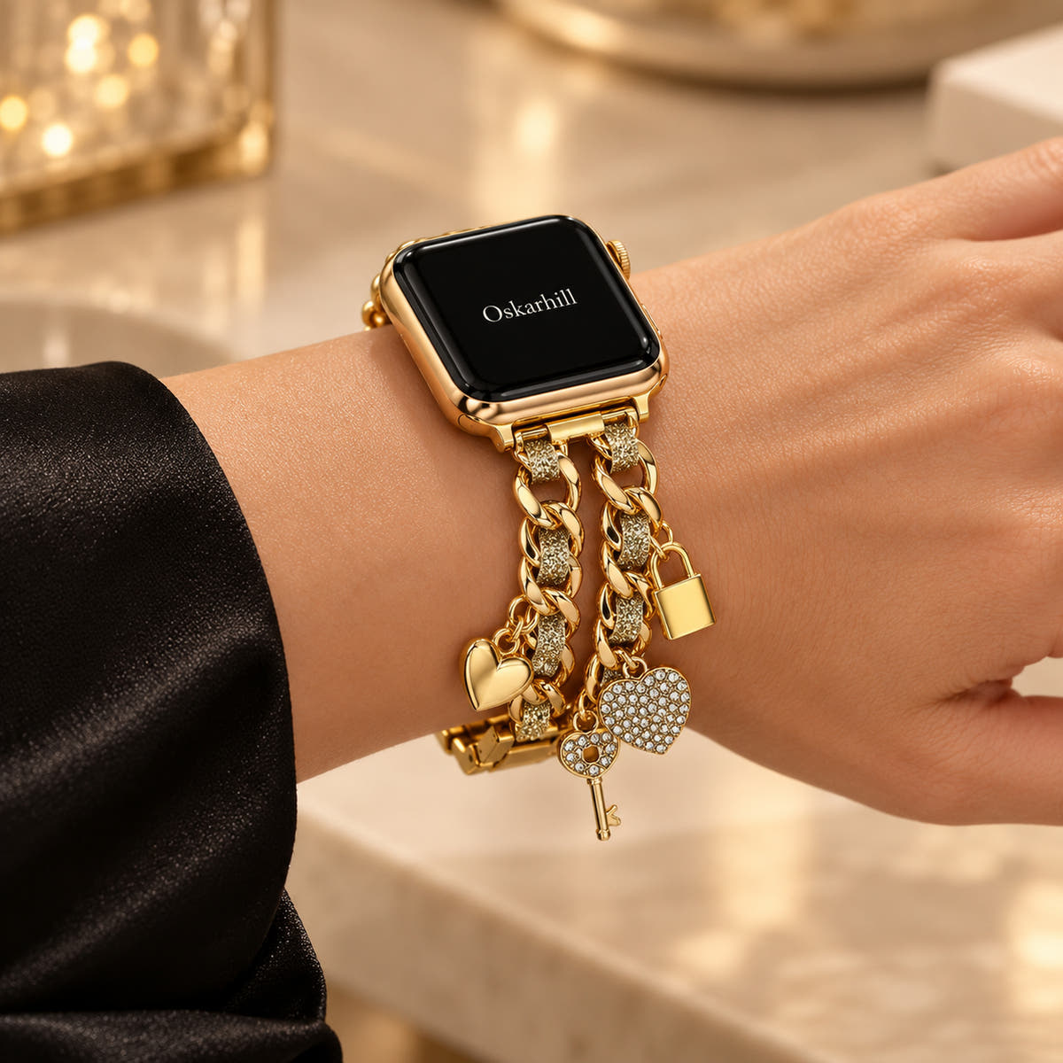 Oskar Hill Amorette Apple Watch charm band — feminine wrist styled with a black satin sleeve
