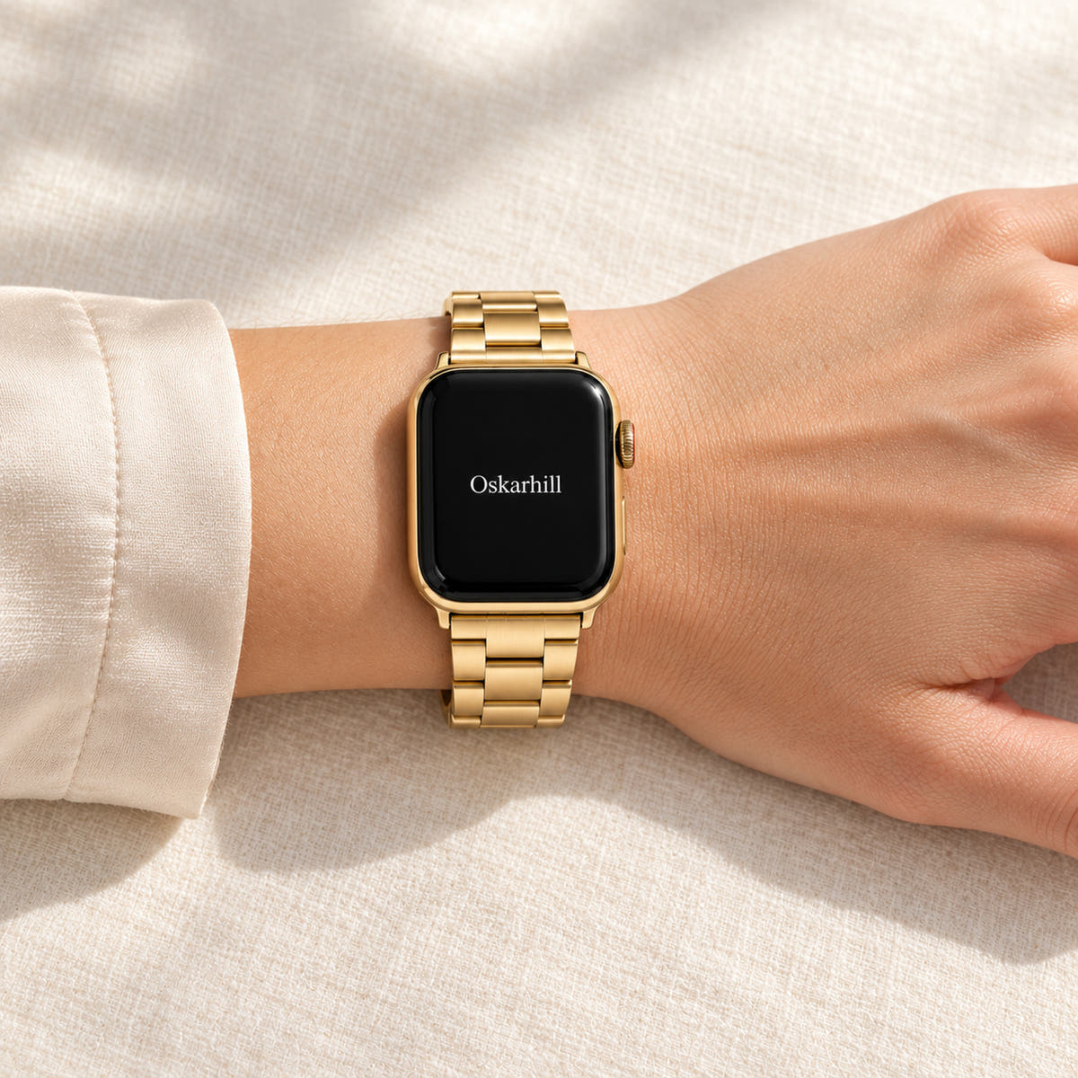 Oskar Hill Florence Gold Flat Link Apple Watch Band — relaxed wrist styling with band wrapped around wrist