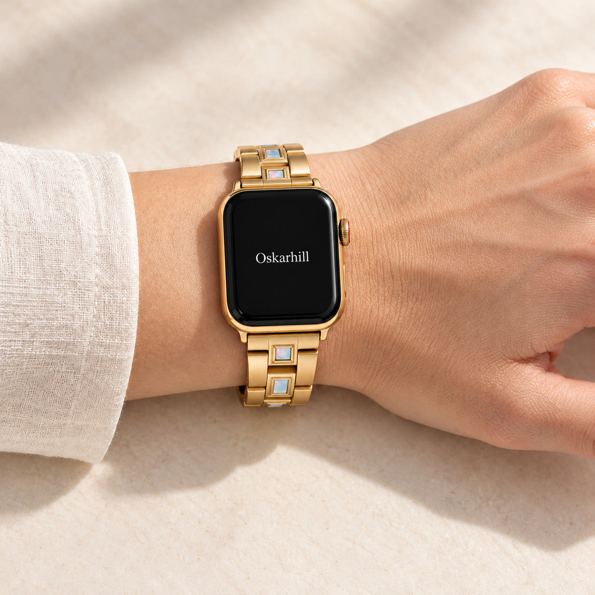 Oskar Hill Seraphine Gold Iridescent Link Apple Watch Band — correctly fitted band on wrist