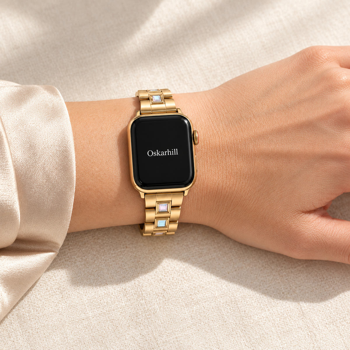 Oskar Hill Seraphine Gold Iridescent Link Apple Watch Band — relaxed wrist styling with band wrapped around wrist