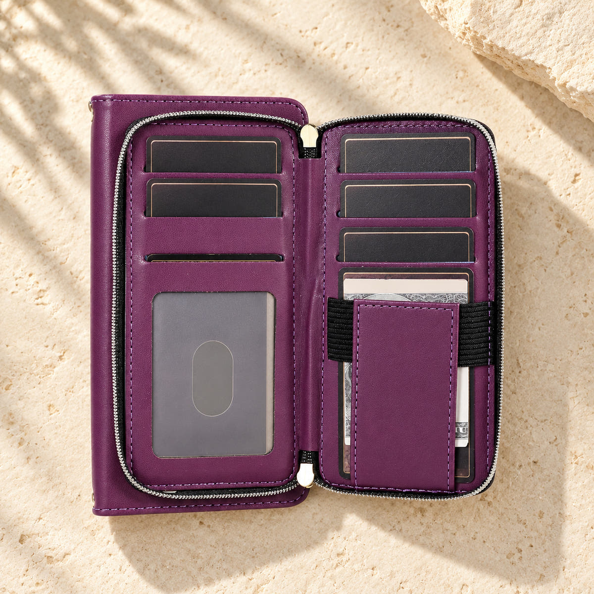 Purple padded wallet with zip compartment open showing card and ID storage