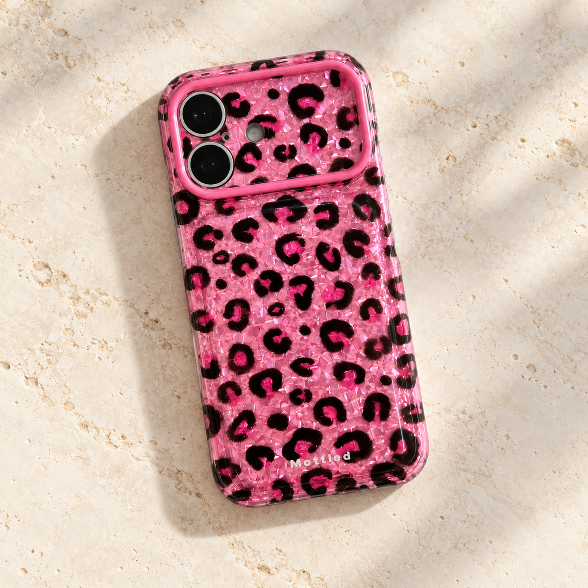 Glitter Leopard iPhone Case in Pink — diagonal rear flatlay