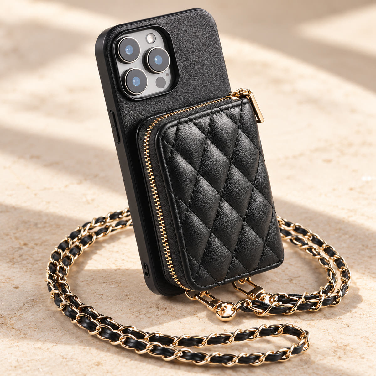 Black quilted iPhone wallet case — diamond quilting, stitching and gold zip detail