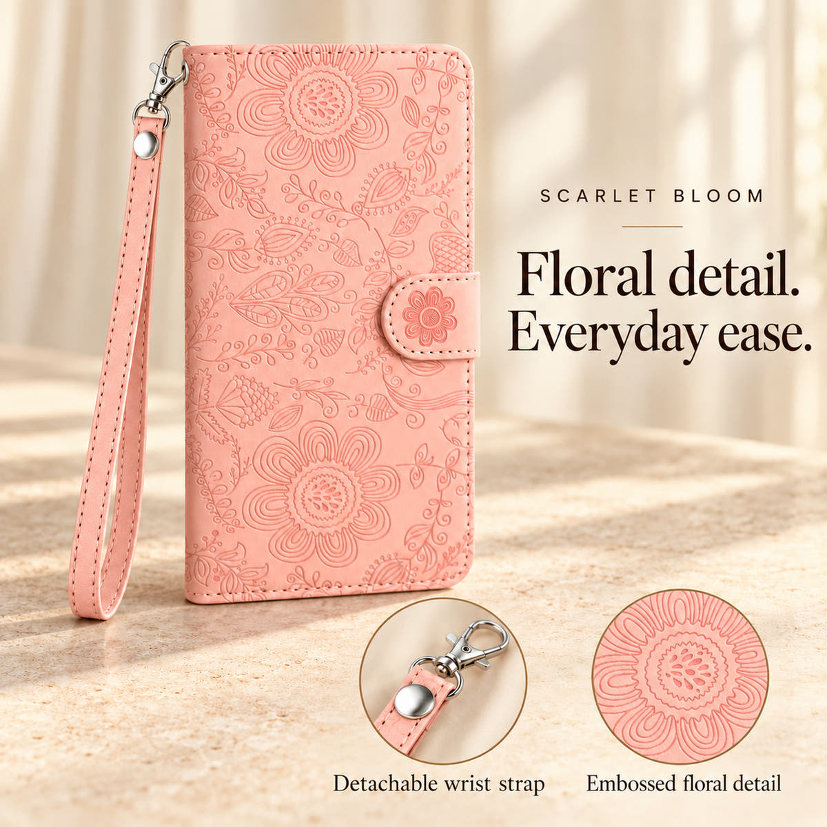 Scarlet Bloom Pink floral wallet case with feature details for its detachable wrist strap, silver-tone clip and embossed floral design.