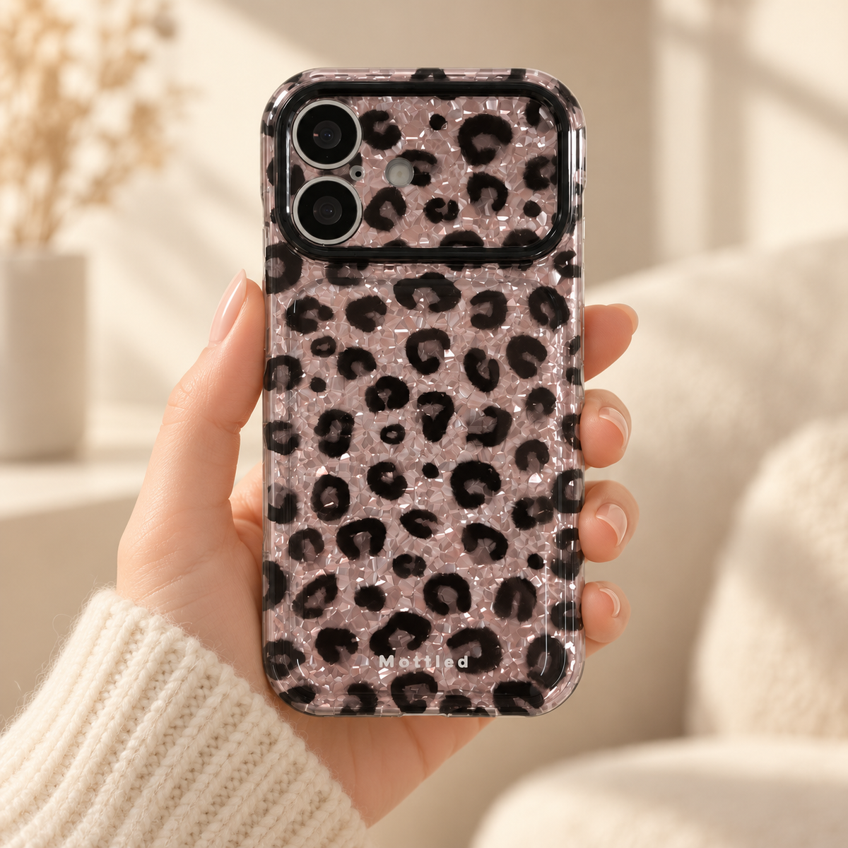 Glitter Leopard iPhone Case in Silver — handheld rear view