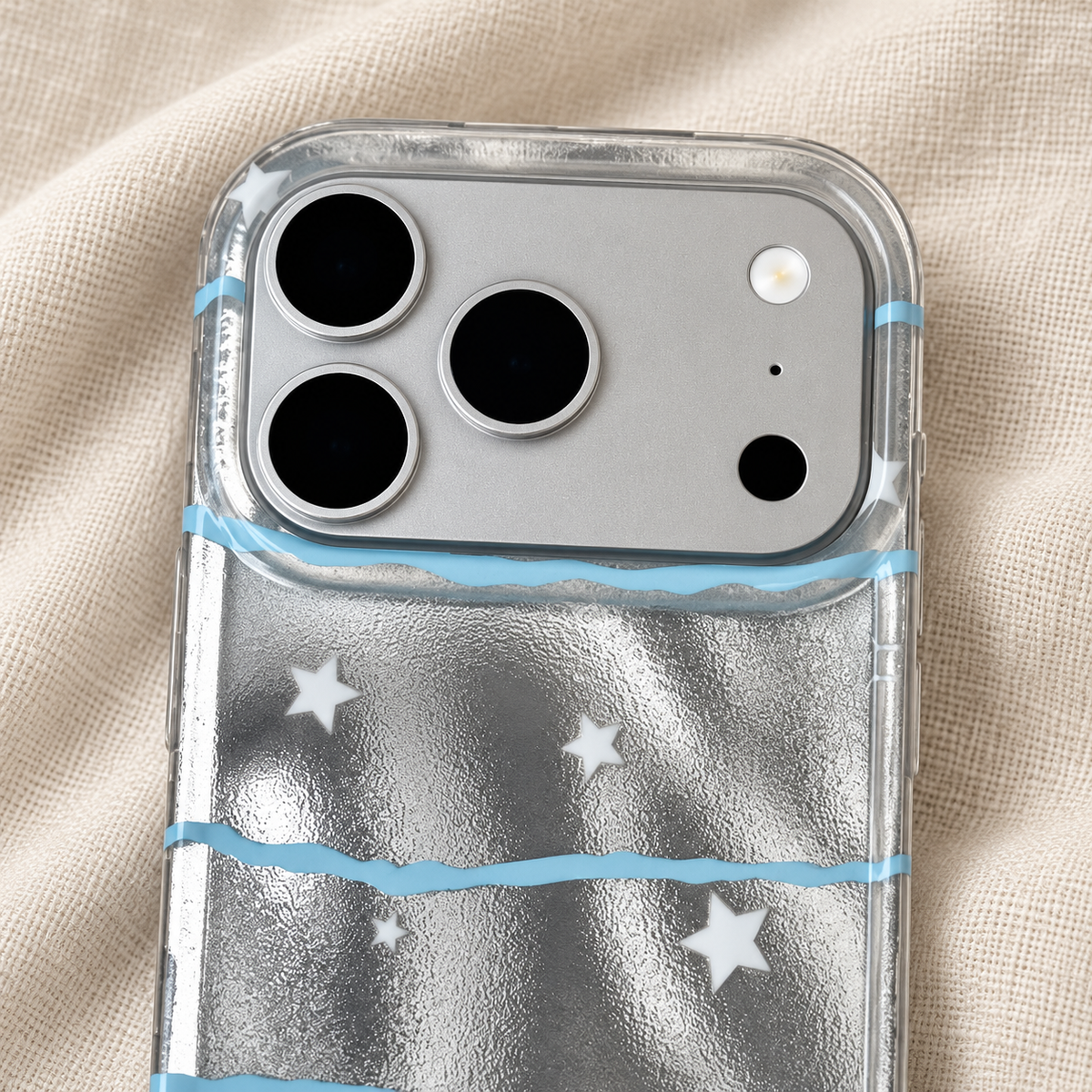 Close-up of the Silver Star Wave case's clear camera surround, pale-blue line and white star details.