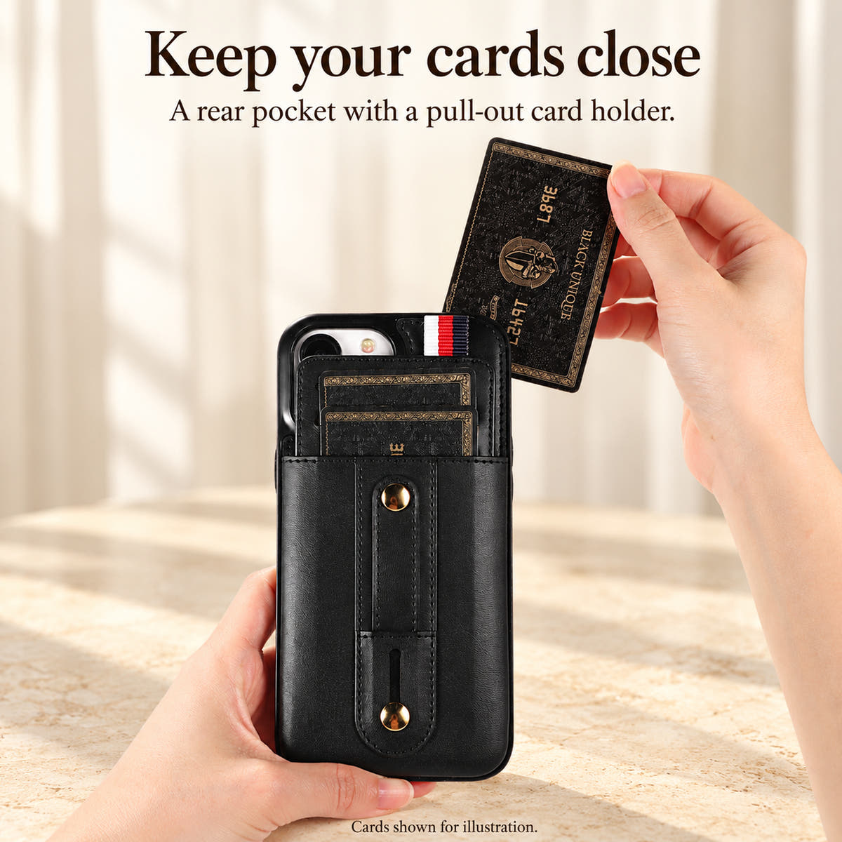 Black iPhone wallet case showing the removable card holder insert pulled from the rear pocket