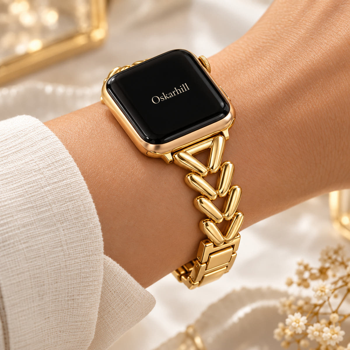 Side view of the Monelle gold chevron bracelet band fitted around a wrist