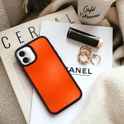 Coque iPhone 16 Elite Leather — Orange rougeâtre