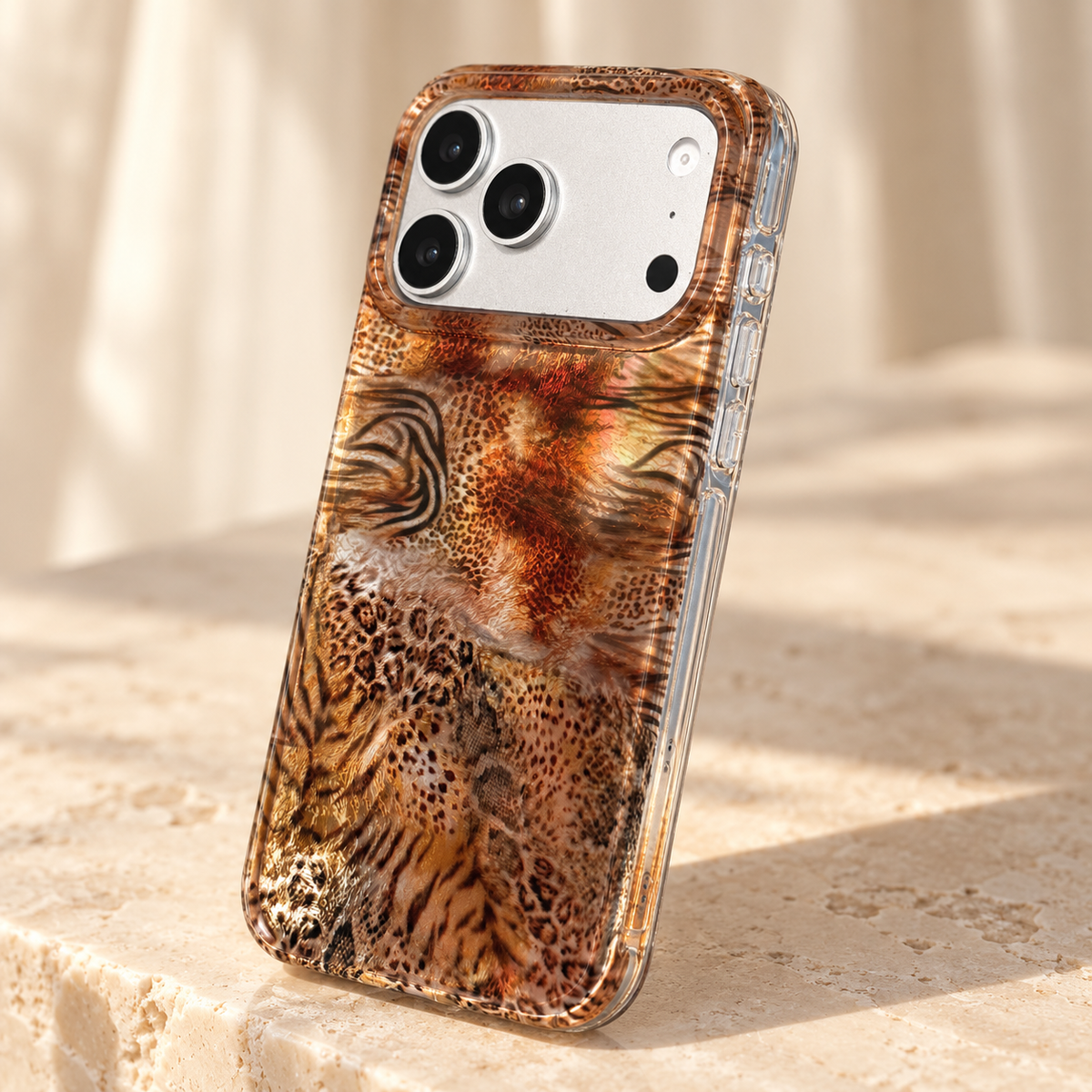 Clear side edge and control detail of the Animal Mix Amber Shimmer iPhone case.