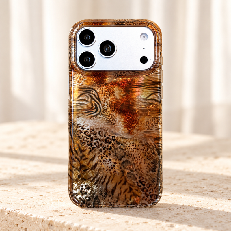 Amber Shimmer iPhone case in Animal Mix with a glossy patterned back and clear outer edges.
