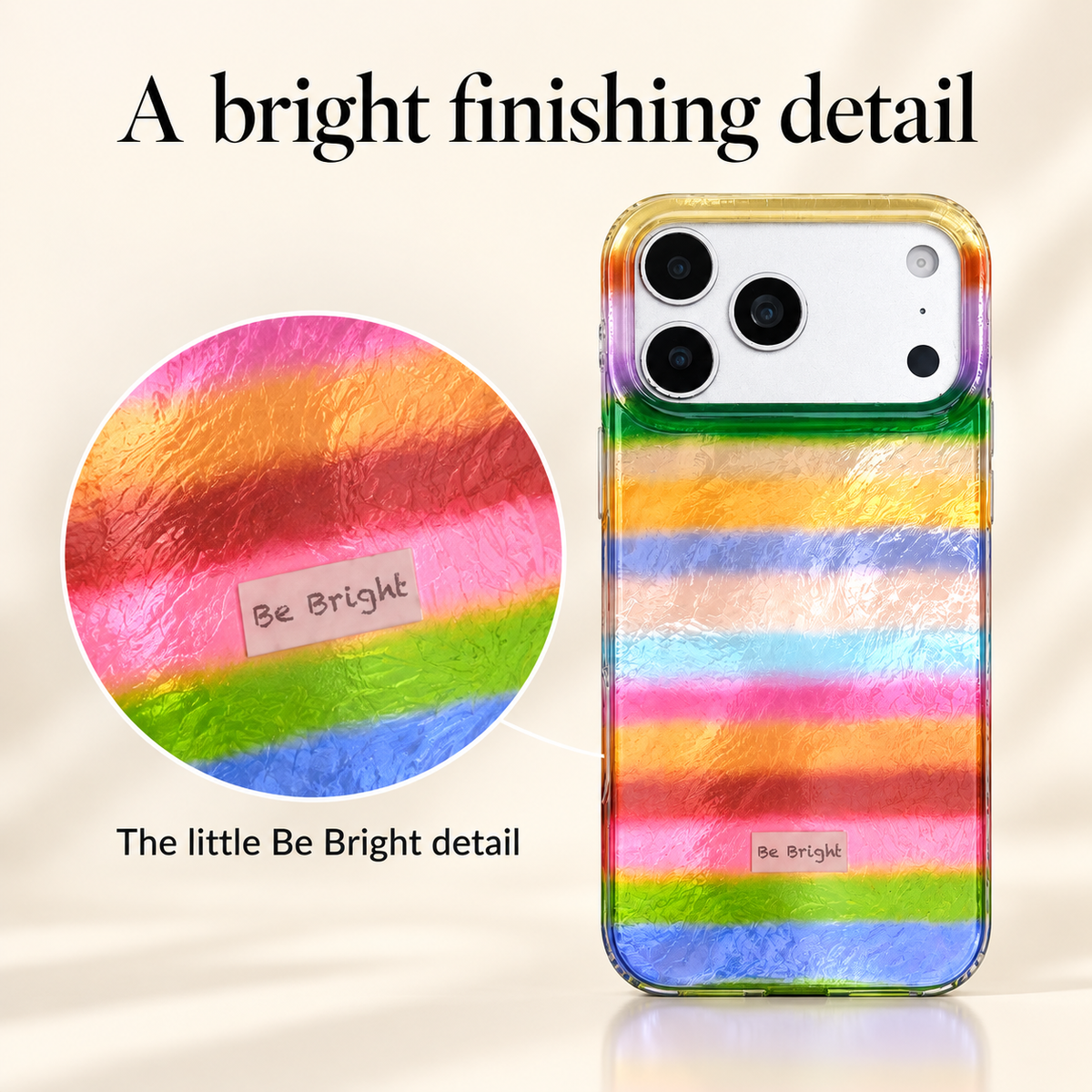 The small Be Bright label on the rainbow stripe iPhone case.