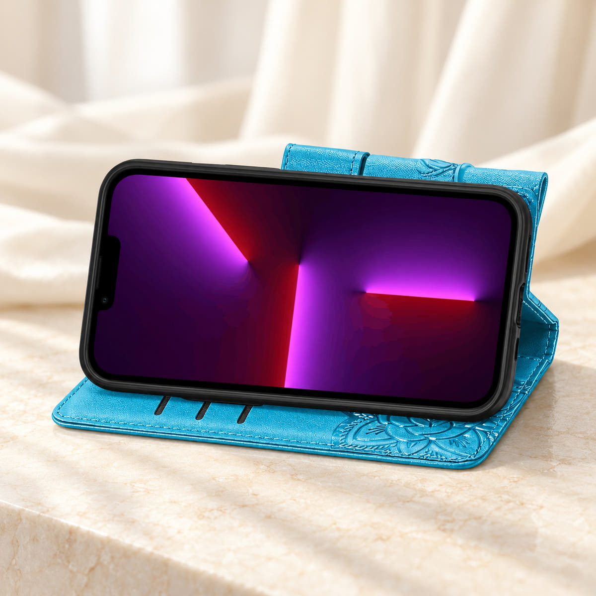 Butterfly iPhone wallet case in Cloud Blue folded into its landscape stand, with the original interior card-slot edges visible.