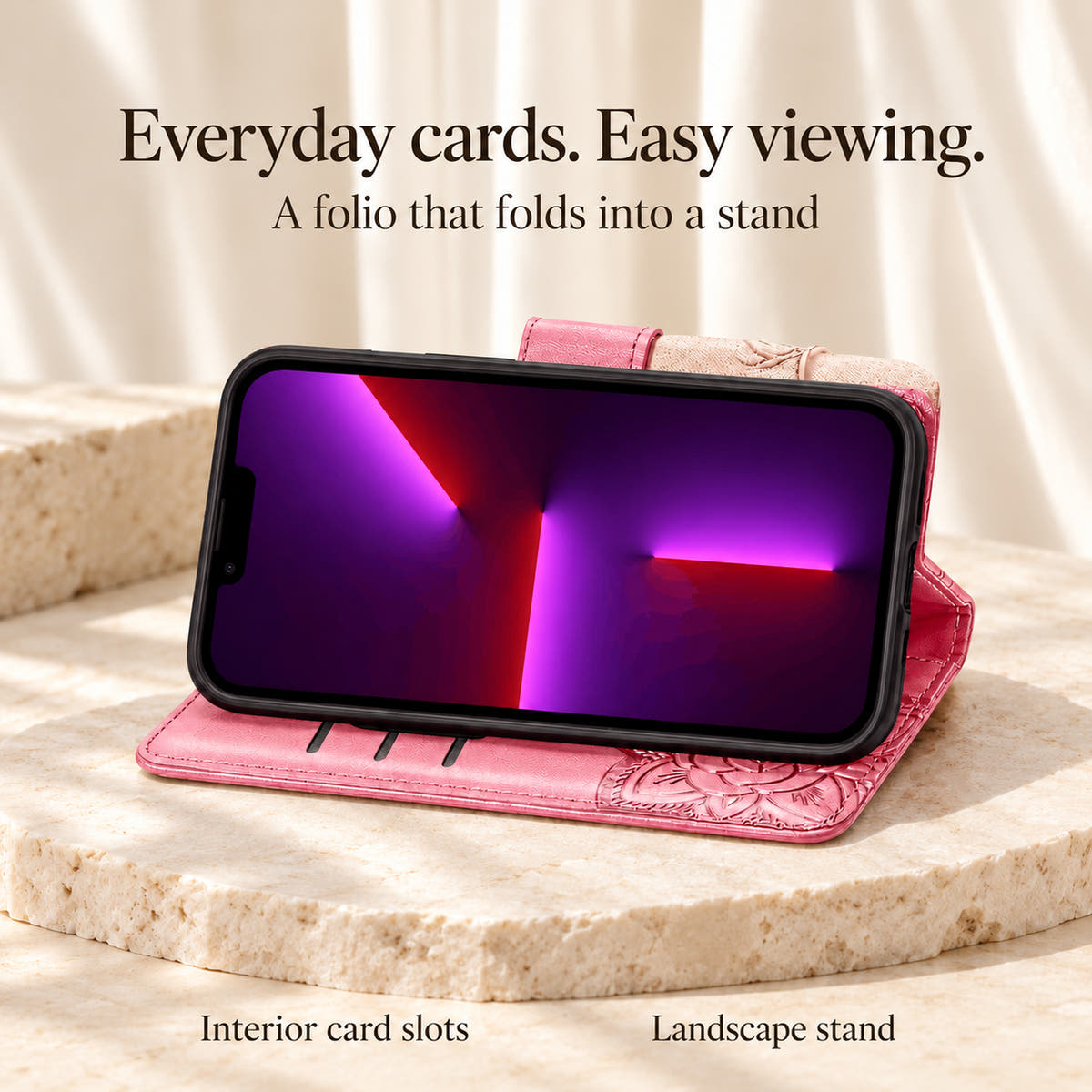 Pink Butterfly wallet iPhone case in landscape stand mode, showing the original card-slot edges beneath the phone.