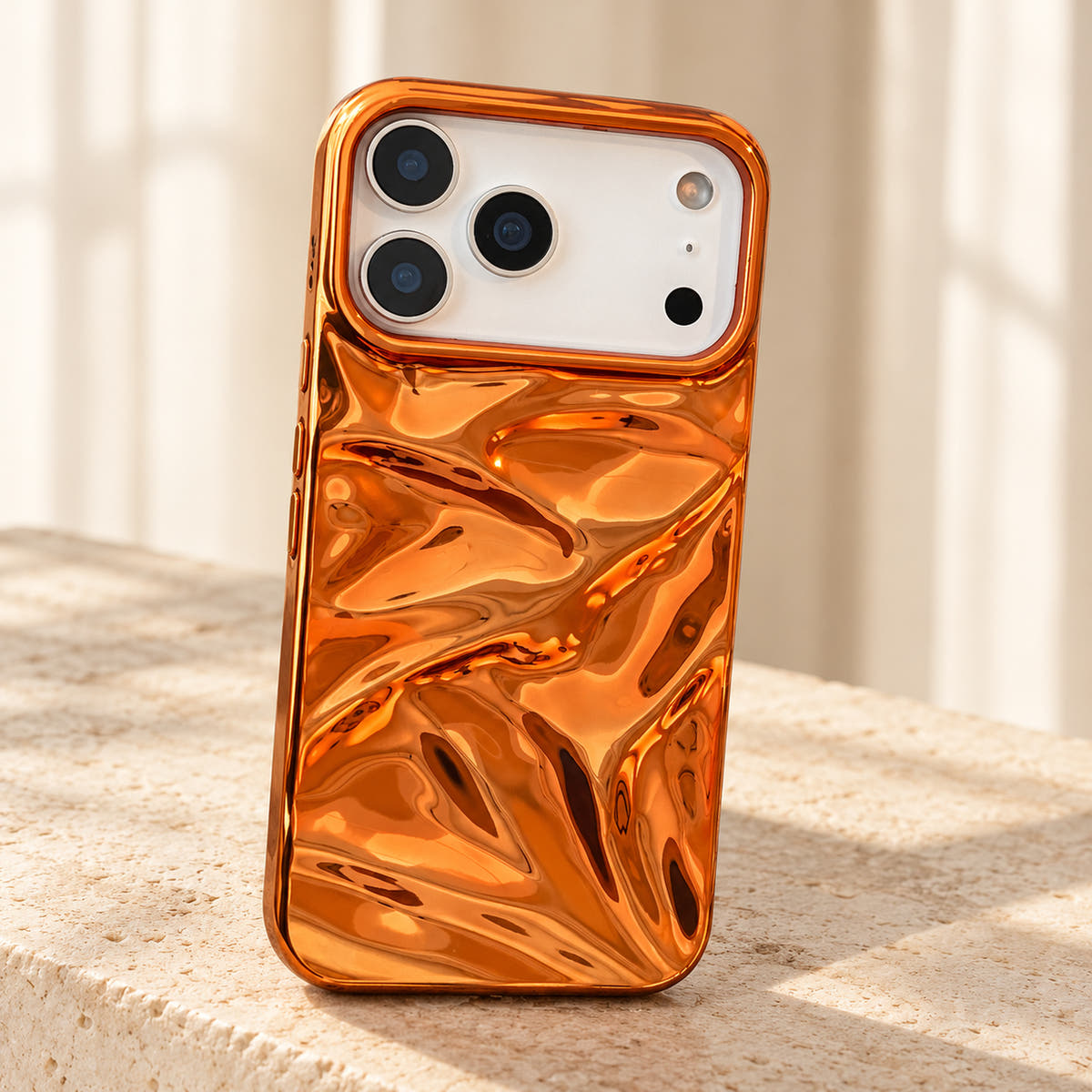 Copper-orange Chrome Wave iPhone case — tabletop portrait view
