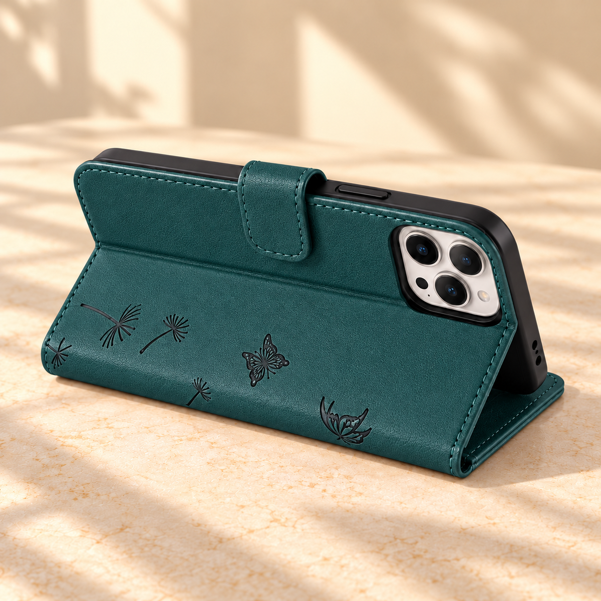Dark Green Dandelion and Butterfly wallet phone case folded into a landscape viewing stand.