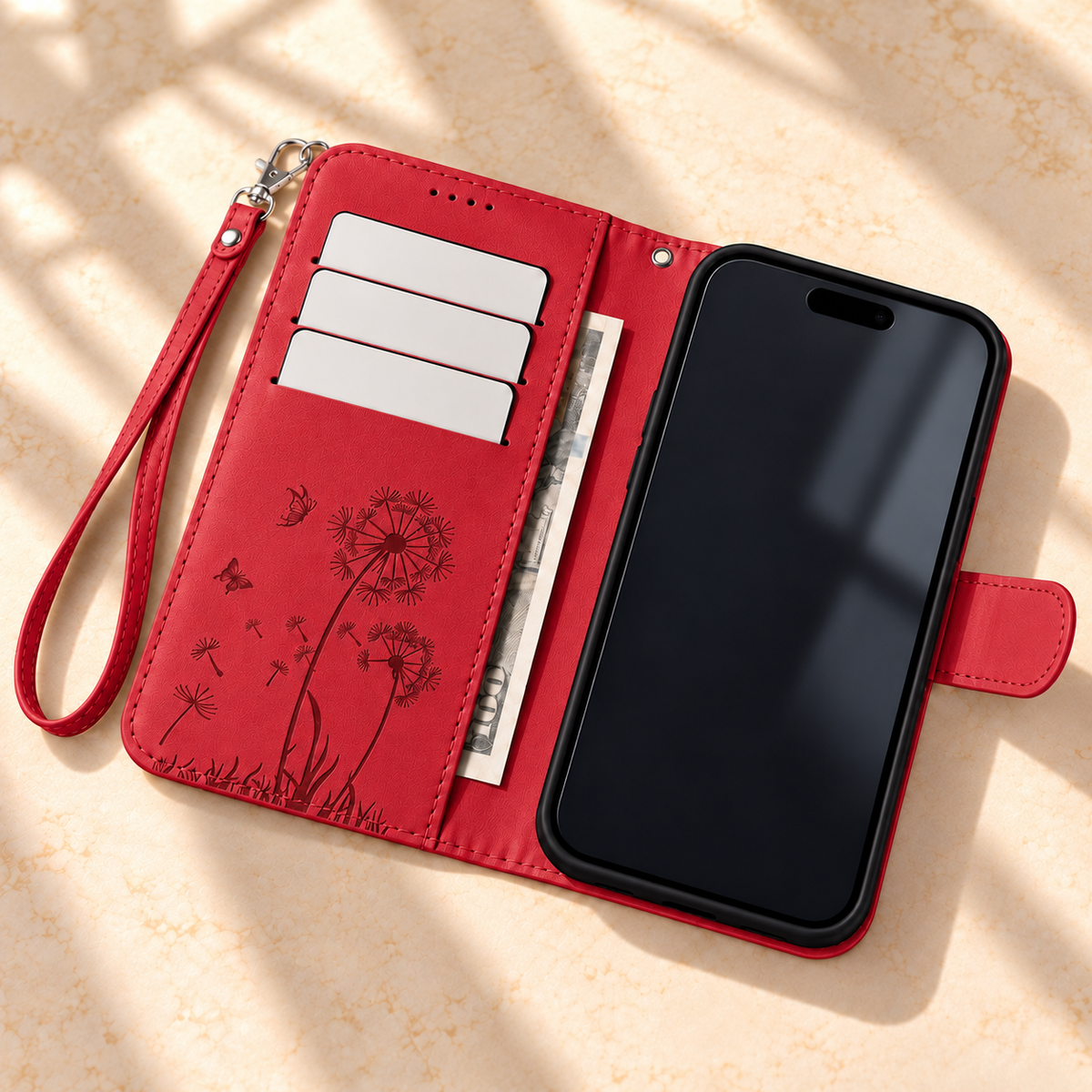 Red Dandelion and Butterfly wallet phone case open, showing three card slots and an inner cash pocket.