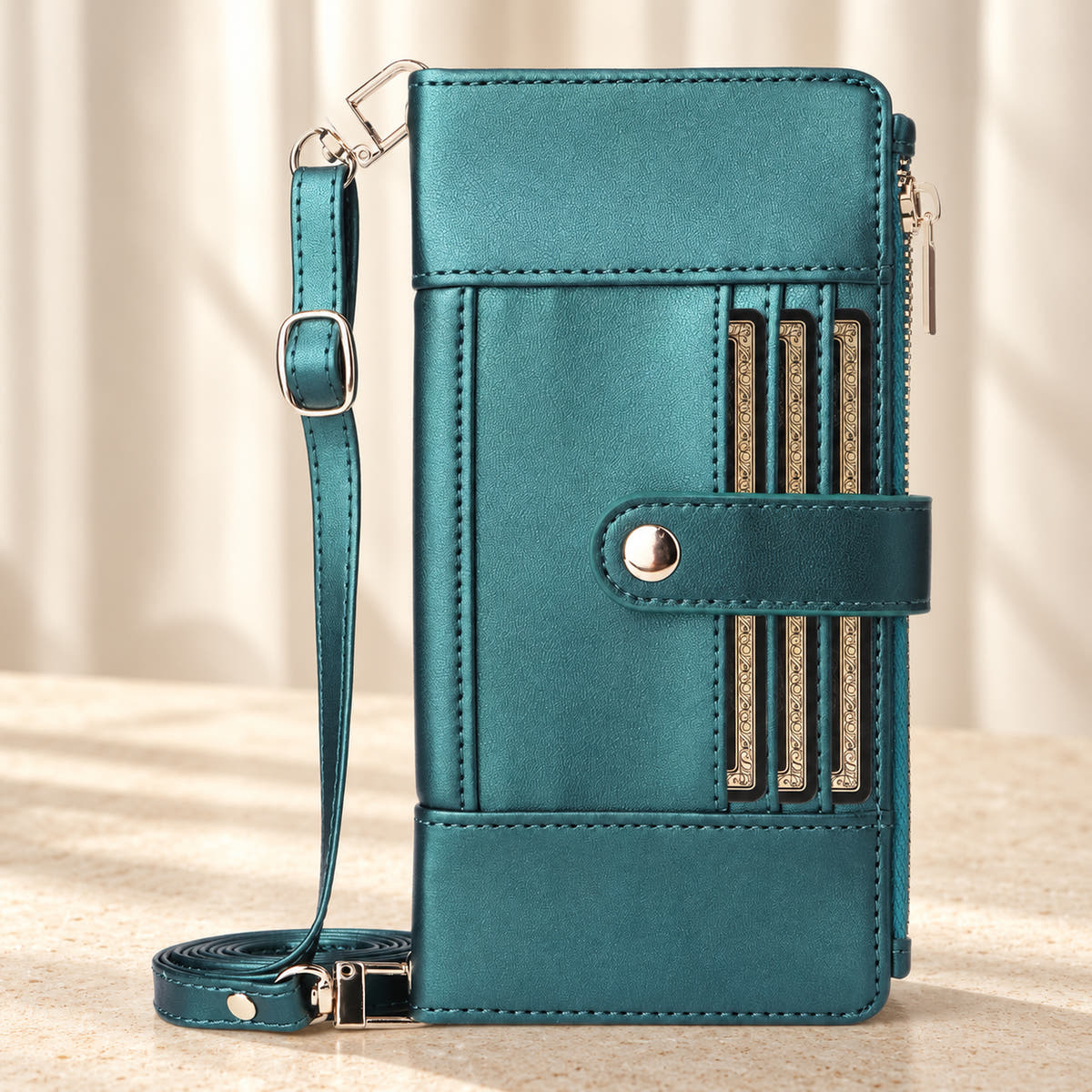 Elaris Crossbody iPhone wallet case in Forest Green, closed front view with adjustable strap.