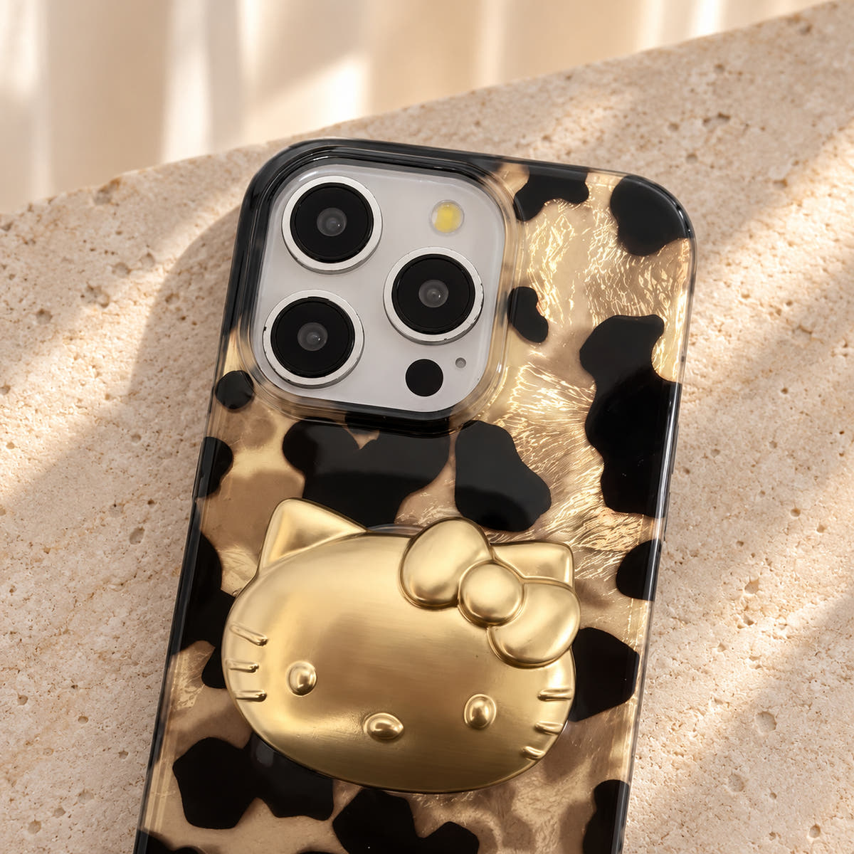 Glam Kitty case with kitty in a close-up showing the original camera opening and surrounding leopard print.